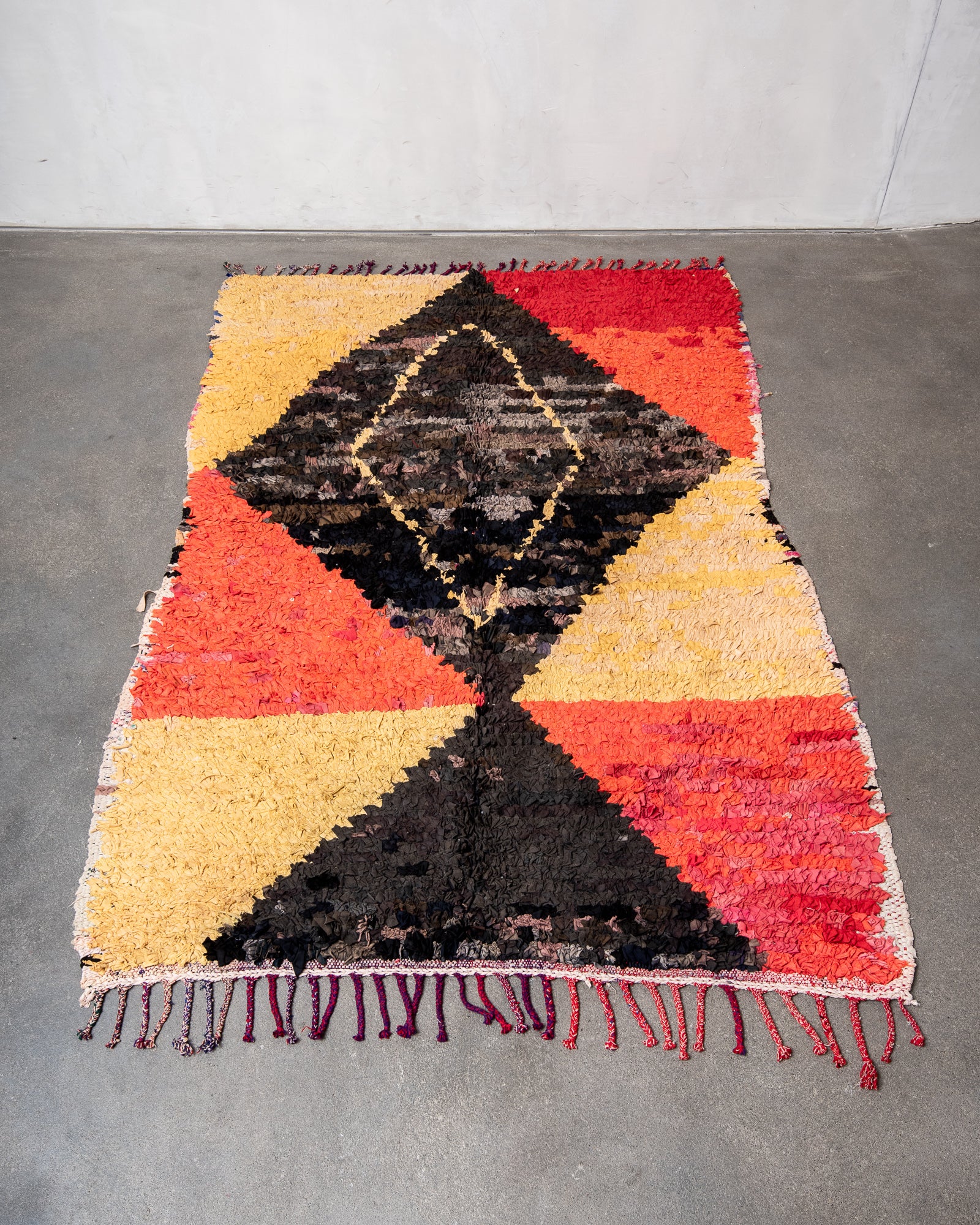 Modern designer vintage handcrafted cotton Berber rug from Morocco. Boucherouite with beautiful colors and patterns.